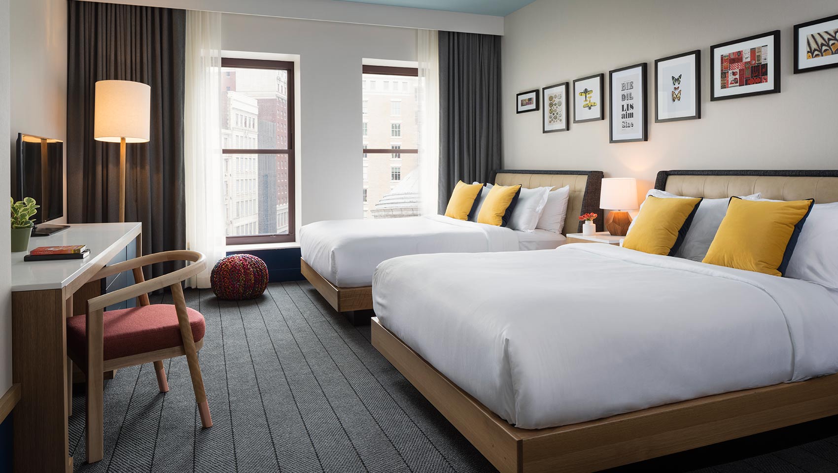 Guestroom with 2 queen beds at Kimpton Schofield Hotel