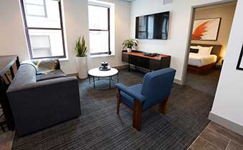 Levi Level Zen Suite sitting area with view of bedroom